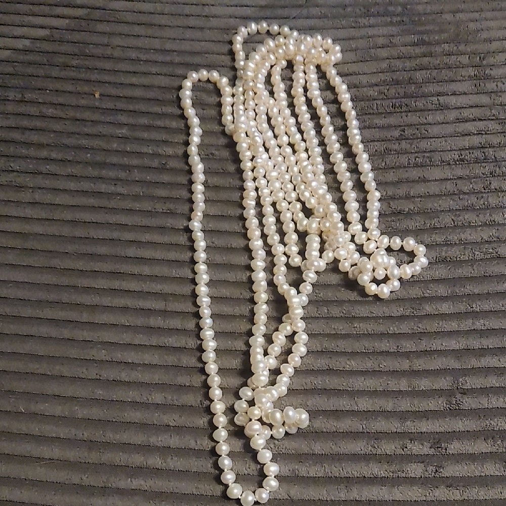 102" Strand Of Silk Tied sea Pearls 6.5mm To 7.5mm